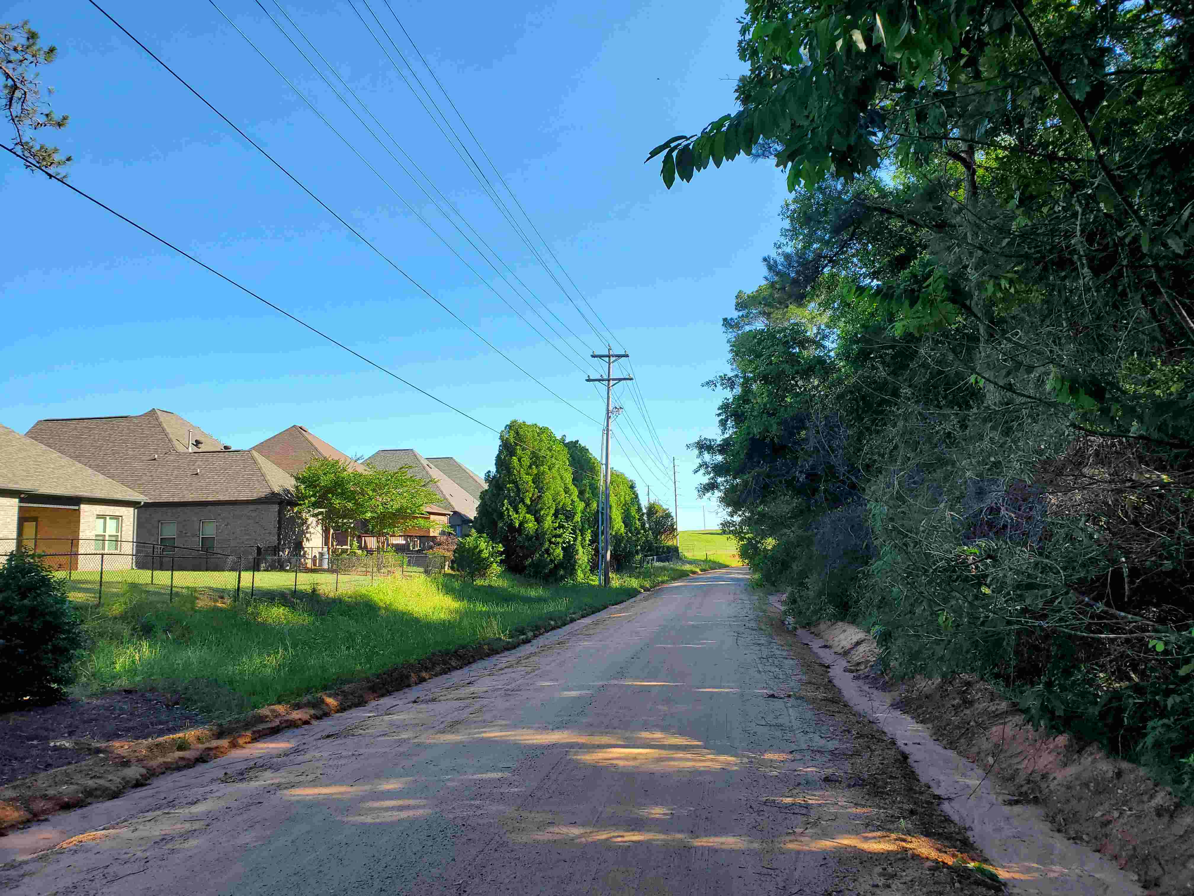 An adjoining subdivision on Pepperwood Trail (property on the right for 1,000 ft)