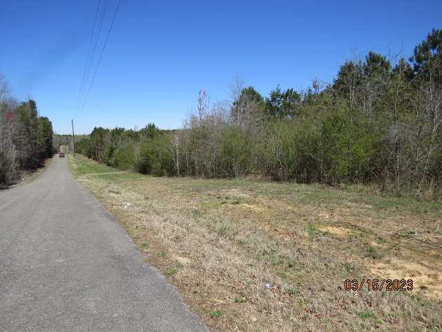 The property fronts on Sandcut Cutoff Rd for about 1/2 mile